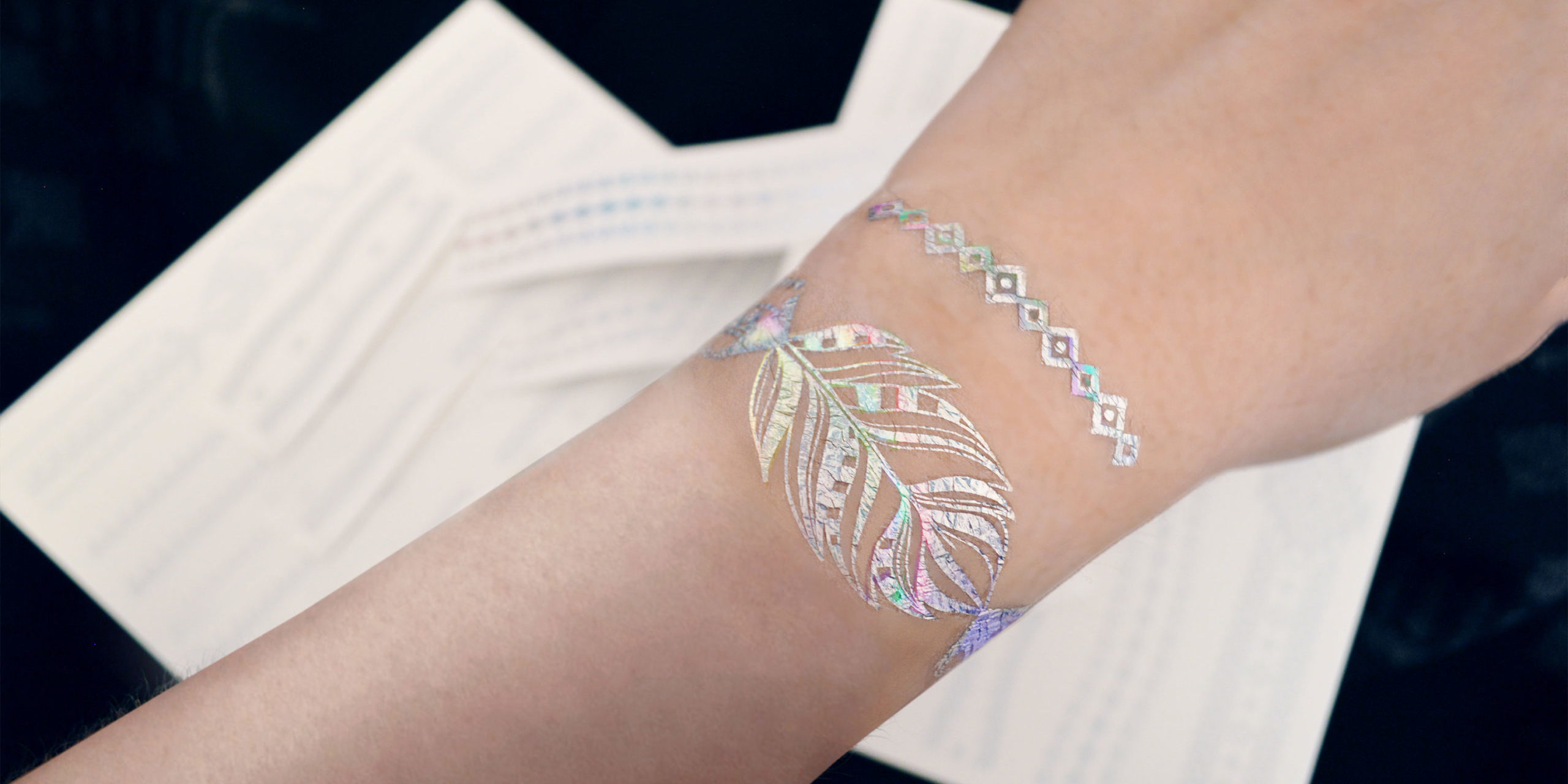 Talented Tattoo Artist Specializes in Holographic Sticker Tattoos